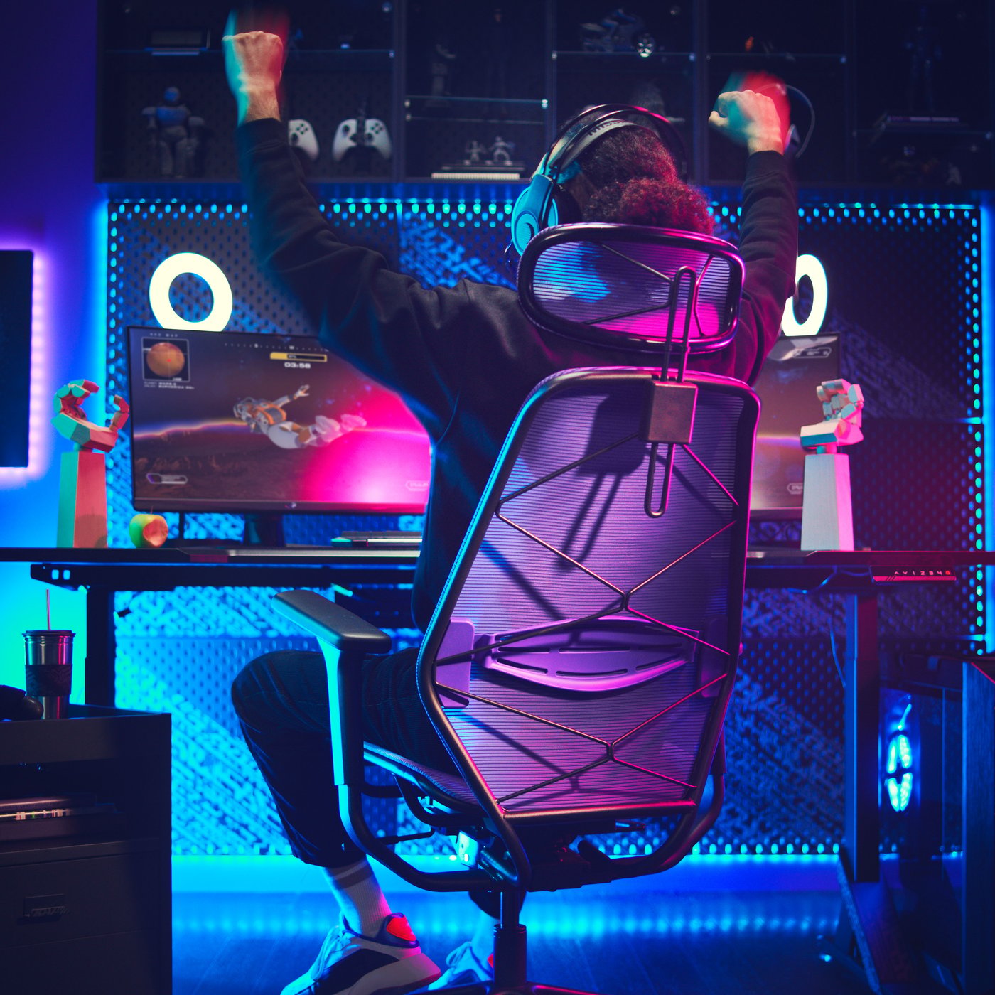 A purple/black STYRSPEL gaming chair