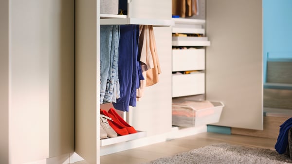 An off-white TONSTAD door in the bedroom