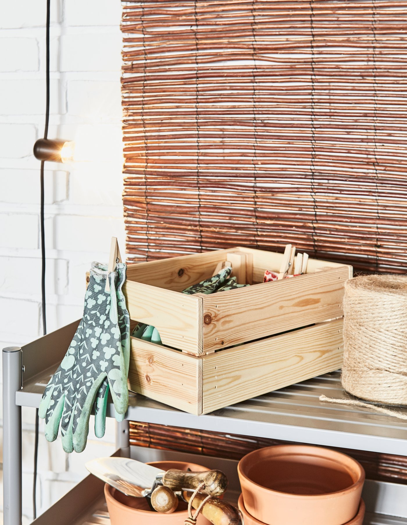 A pine KNAGGLIG box outside