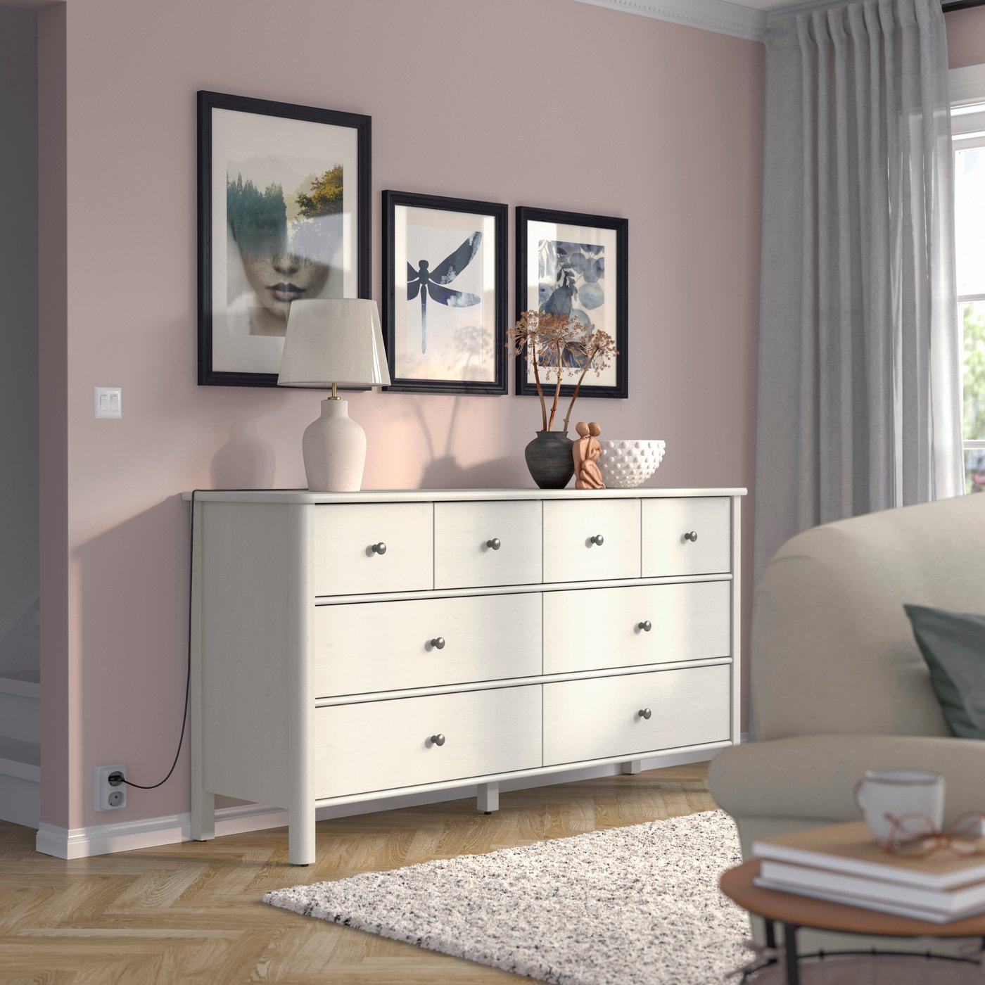 A light grey-beige stained STOREMOLLA chest of 8 drawers