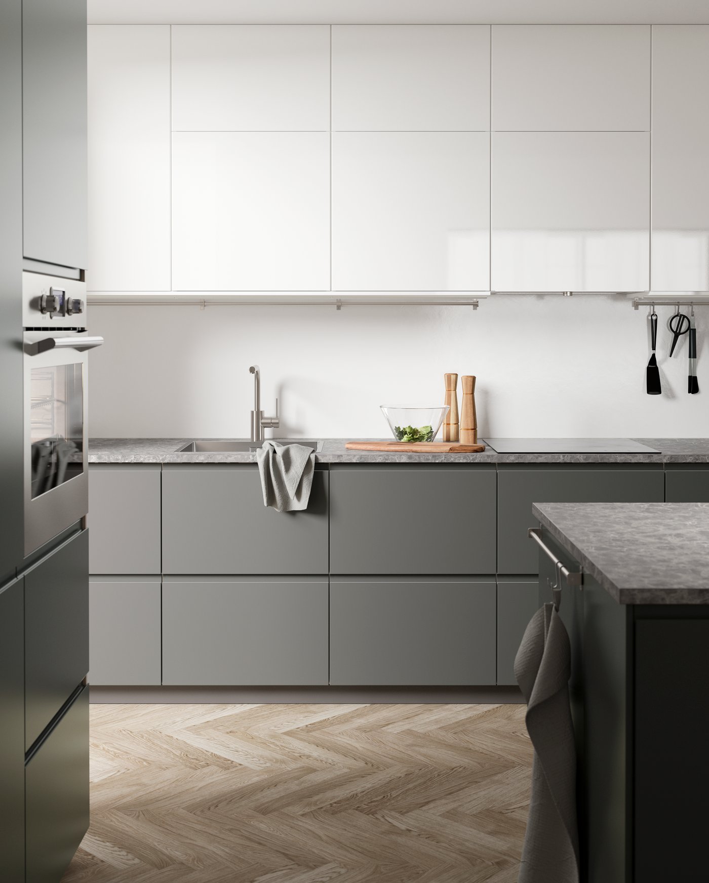 A matt white VOXTORP door in the kitchen