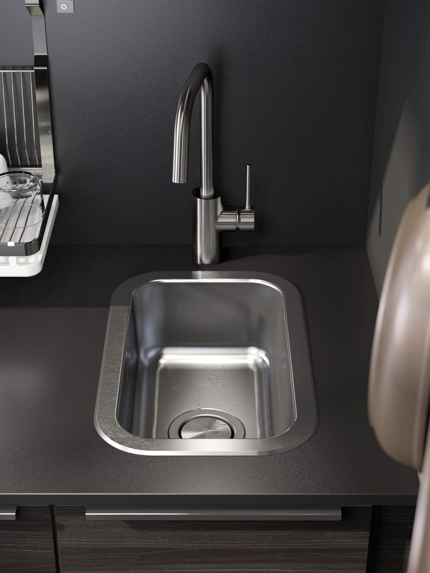 A stainless steel BOHOLMEN single-bowl inset sink in the kitchen
