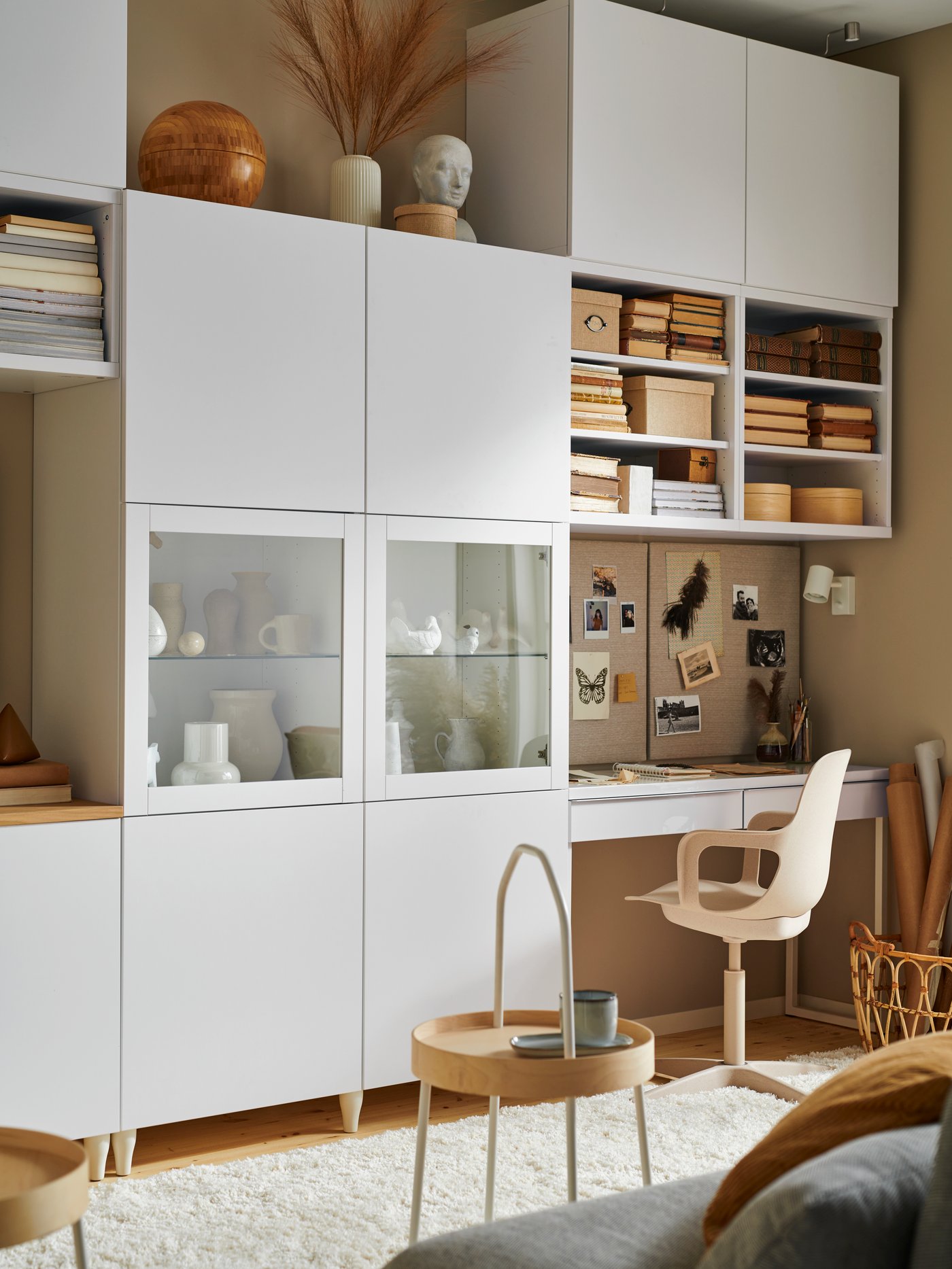 A white/beige ODGER swivel chair in the living room