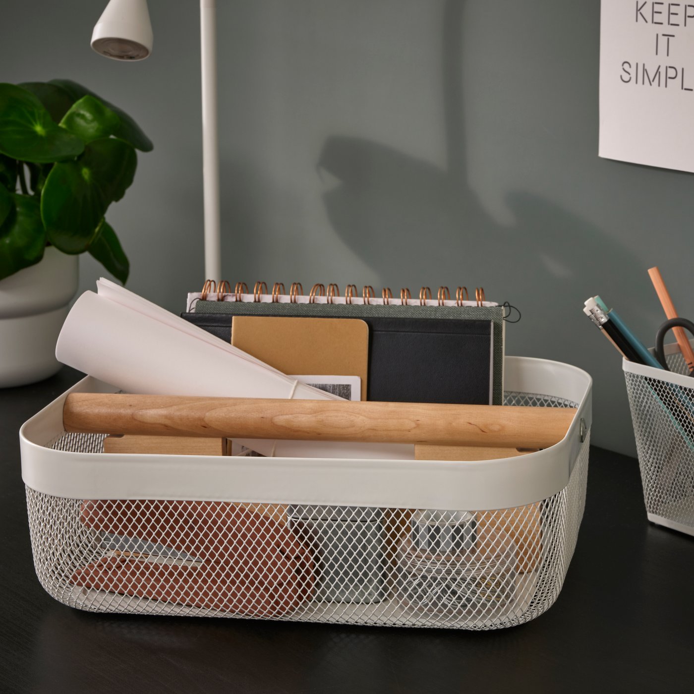 A white RISATORP basket with compartments