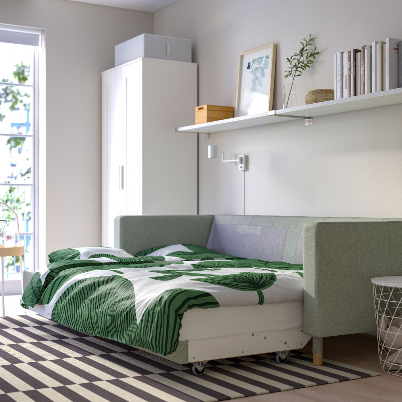 A Gunnared light green/wood LANDSKRONA 3-seat sofa-bed in the living room