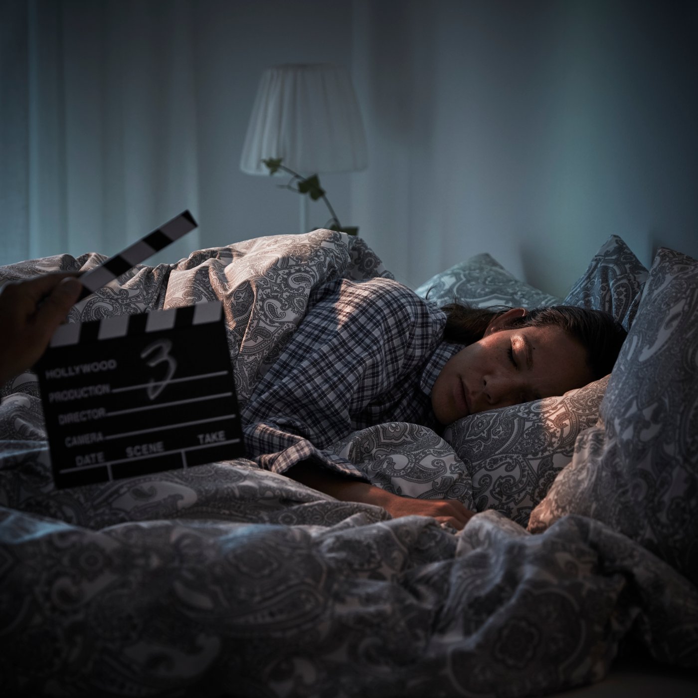 A beige/dark grey JÄTTEVALLMO duvet cover and 2 pillowcases in the bedroom