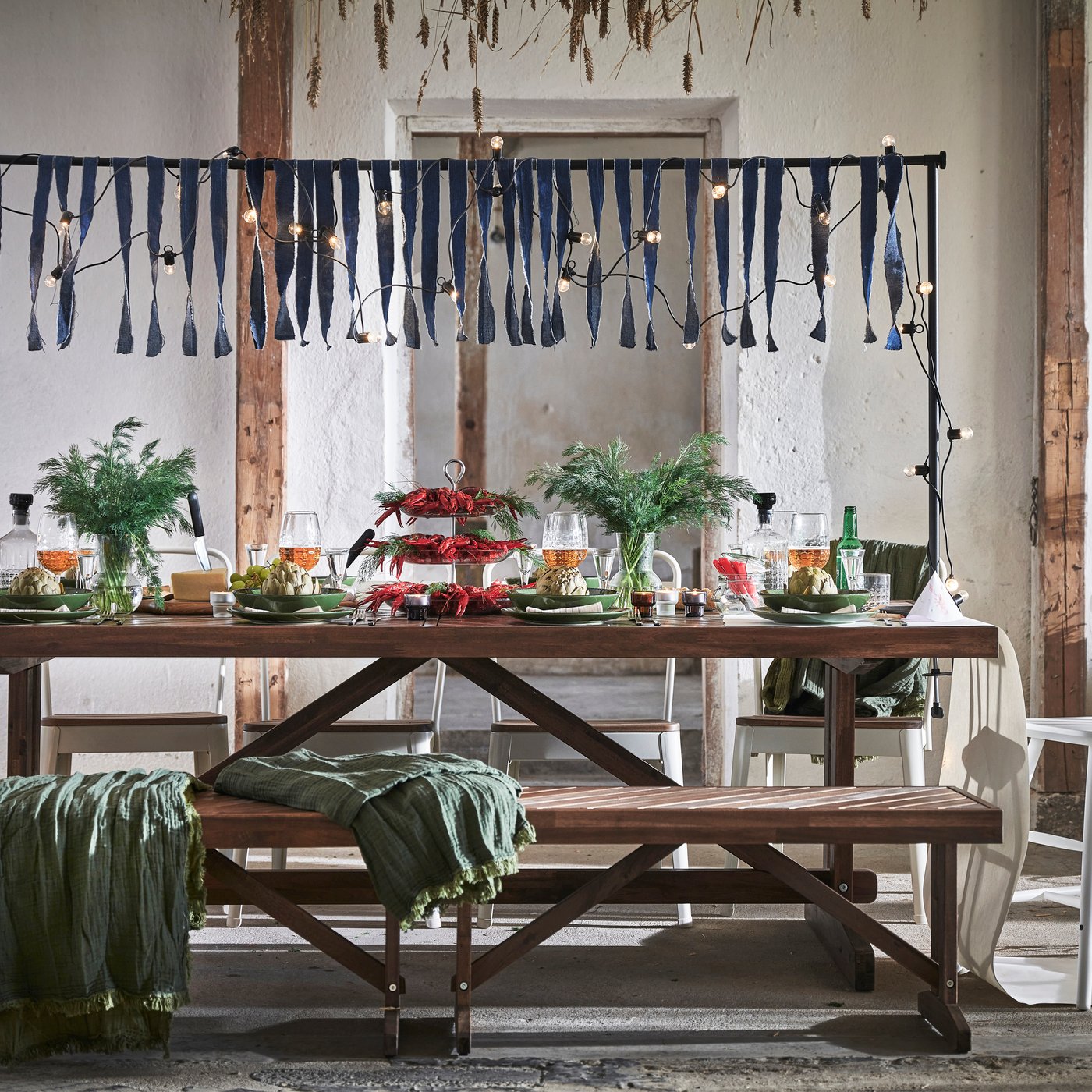 A white adjustable/outdoor indoor  HELGEÖ decorating rod for table