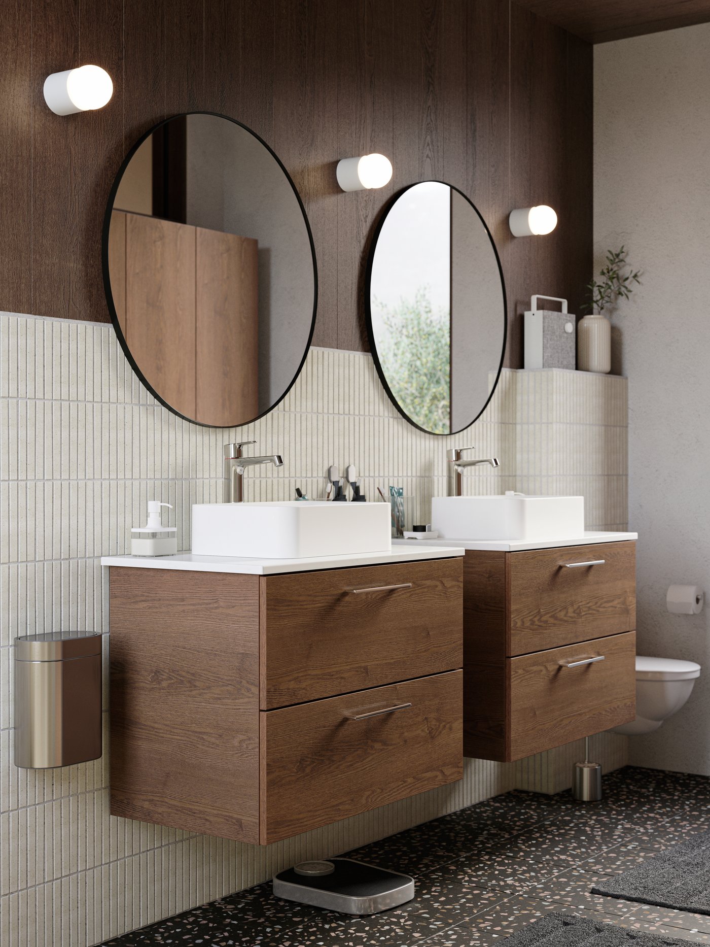 A white ENEBY bluetooth speaker in the bathroom