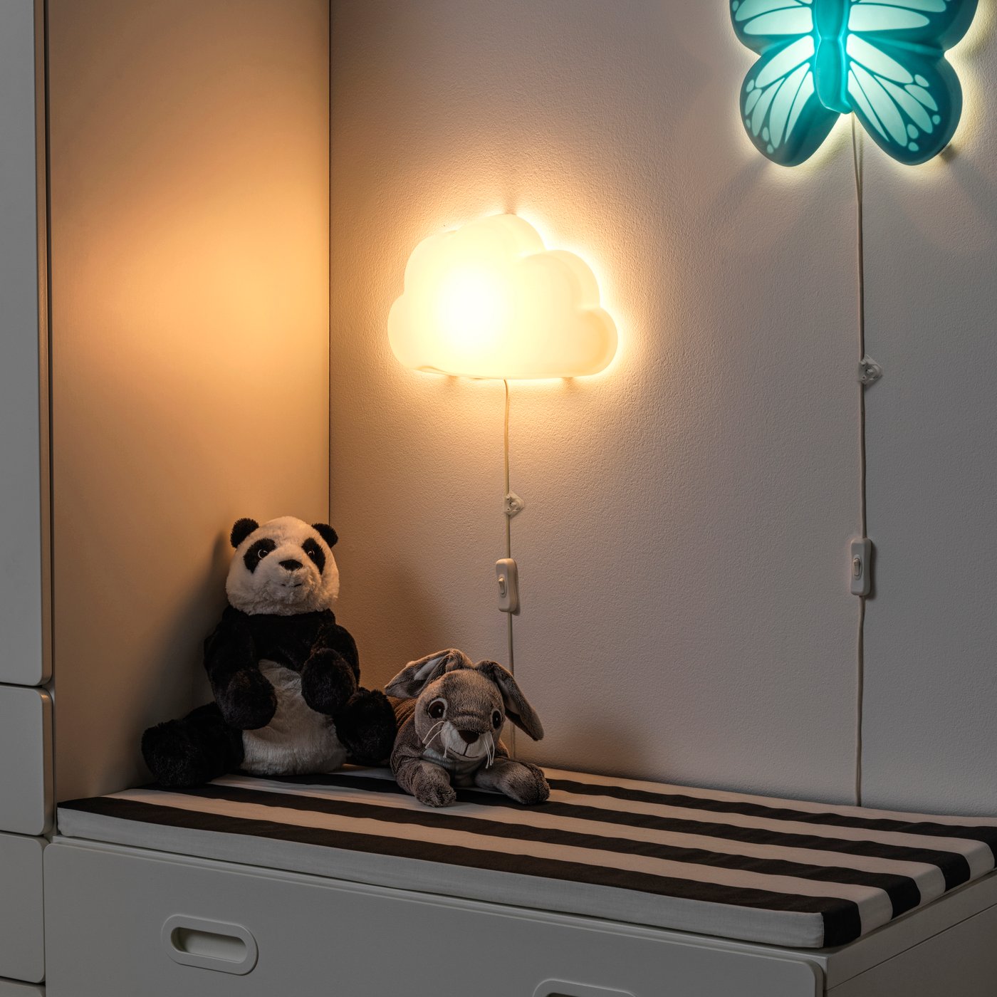 A cloud white UPPLYST LED wall lamp