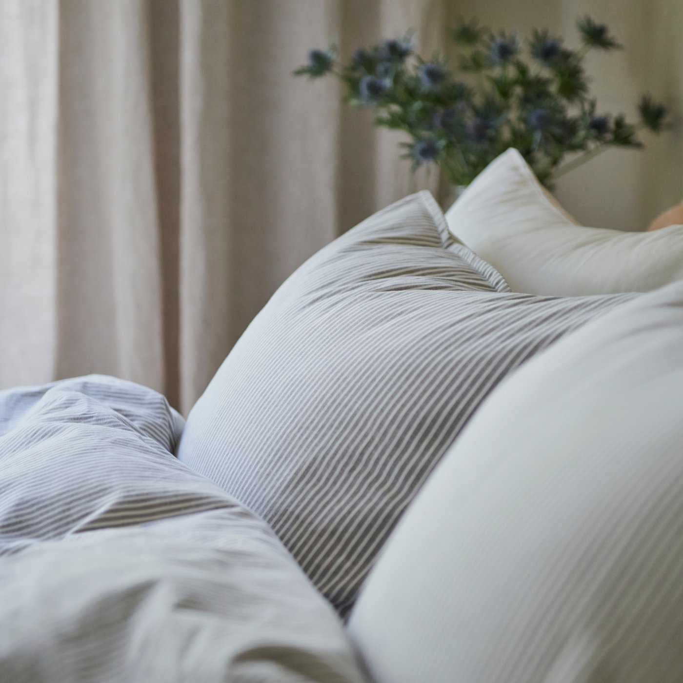 A grey white/stripe SOLFIBBLA duvet cover and pillowcase
