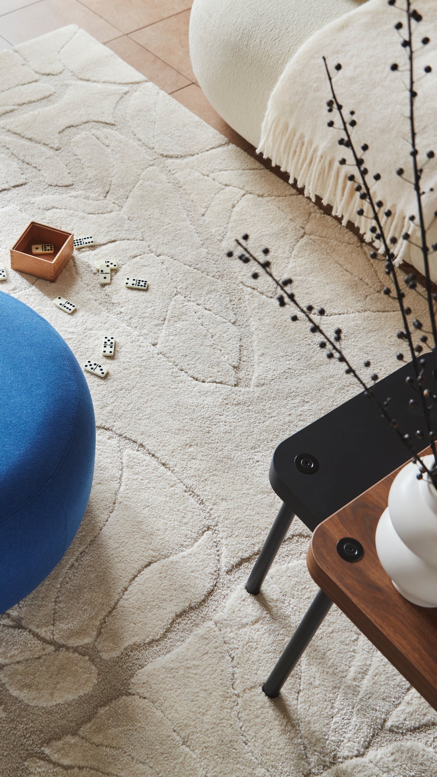 A Gunnared dark blue LILLESÄTER pouffe