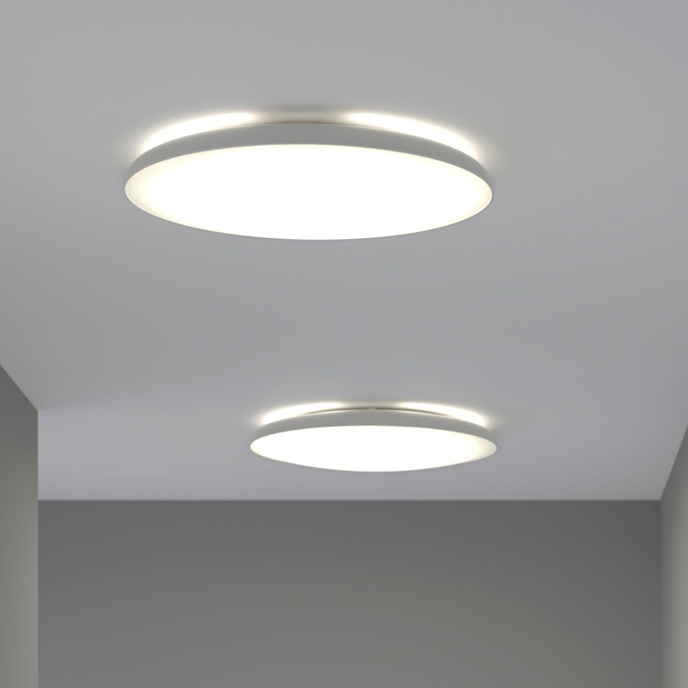 A white NYMÅNE LED ceiling lamp