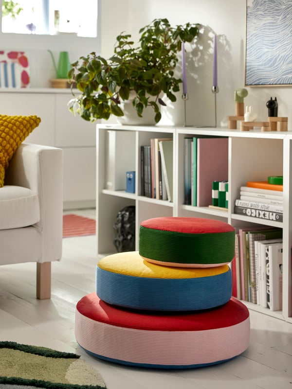 A stackable/multicolour GREJSIMOJS floor cushion