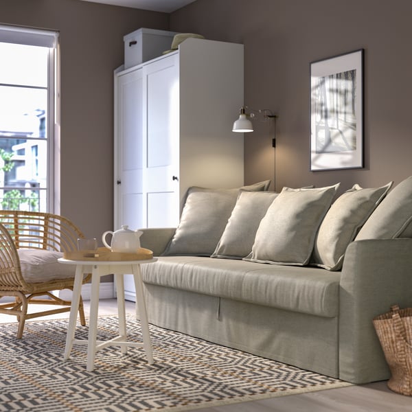 A Borgunda beige HOLMSUND 3-seat sofa bed