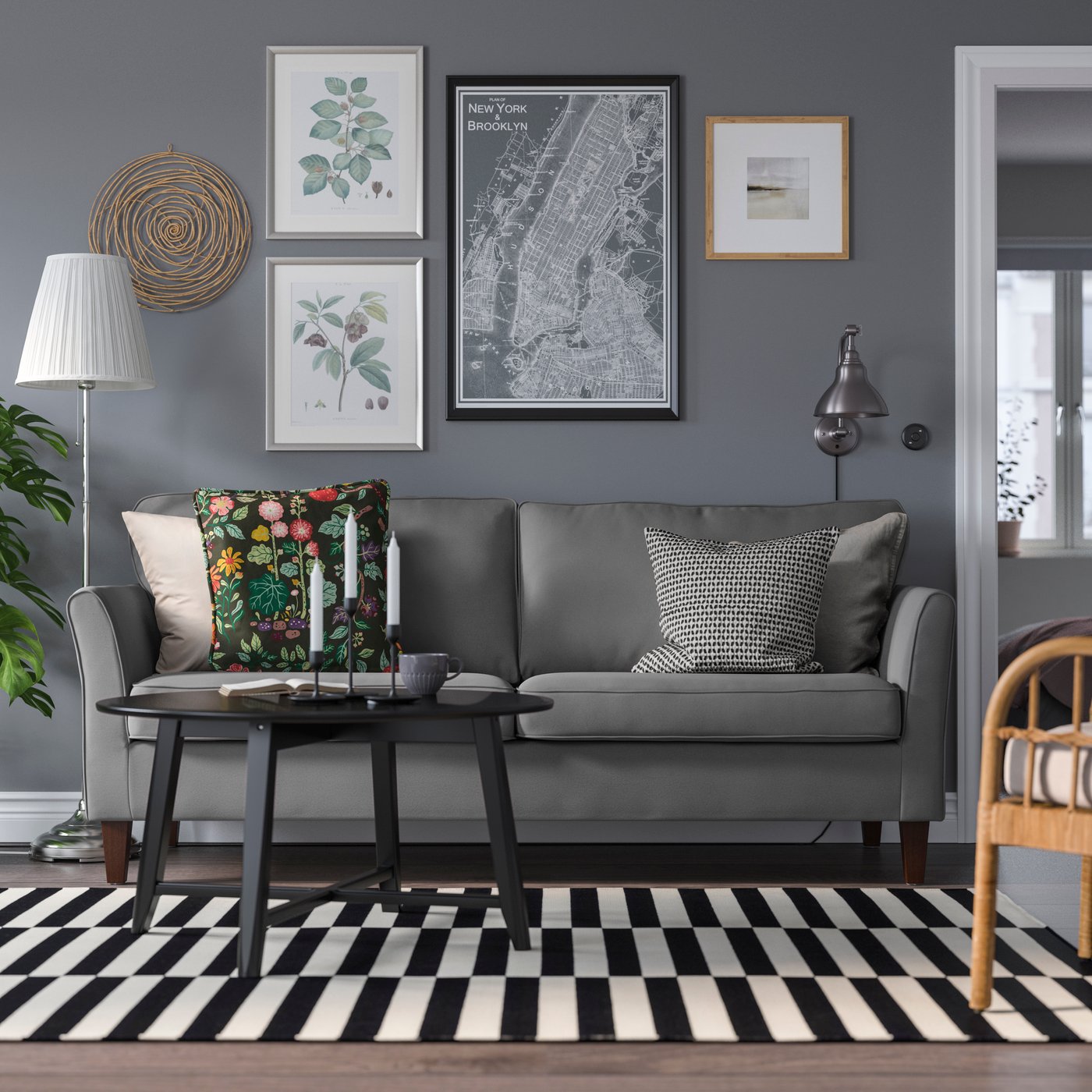 A Hakebo dark grey EKHOLMA 3-seat sofa in the living room