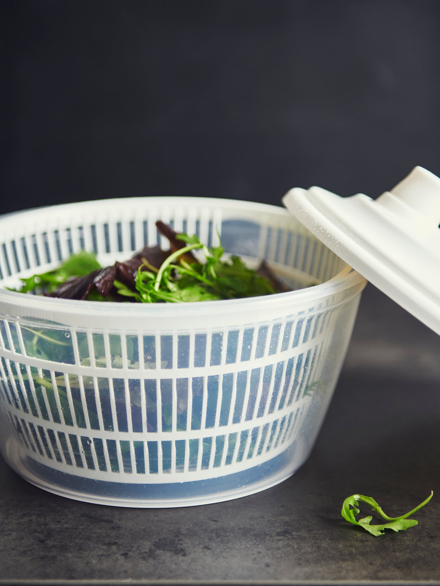 A white UPPFYLLD salad spinner in the NA