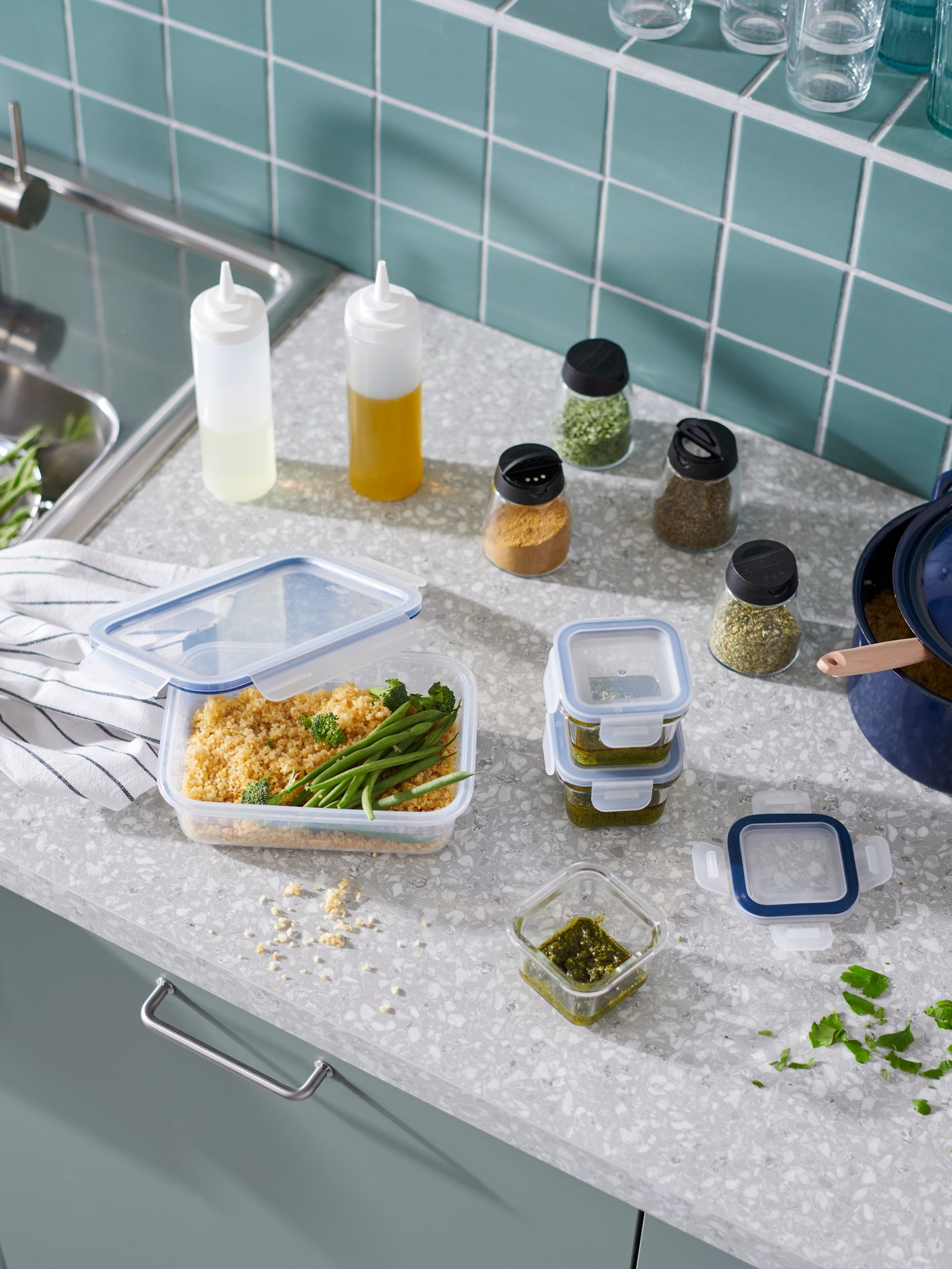 A rectangular/plastic IKEA 365+ food container with lid in the kitchen