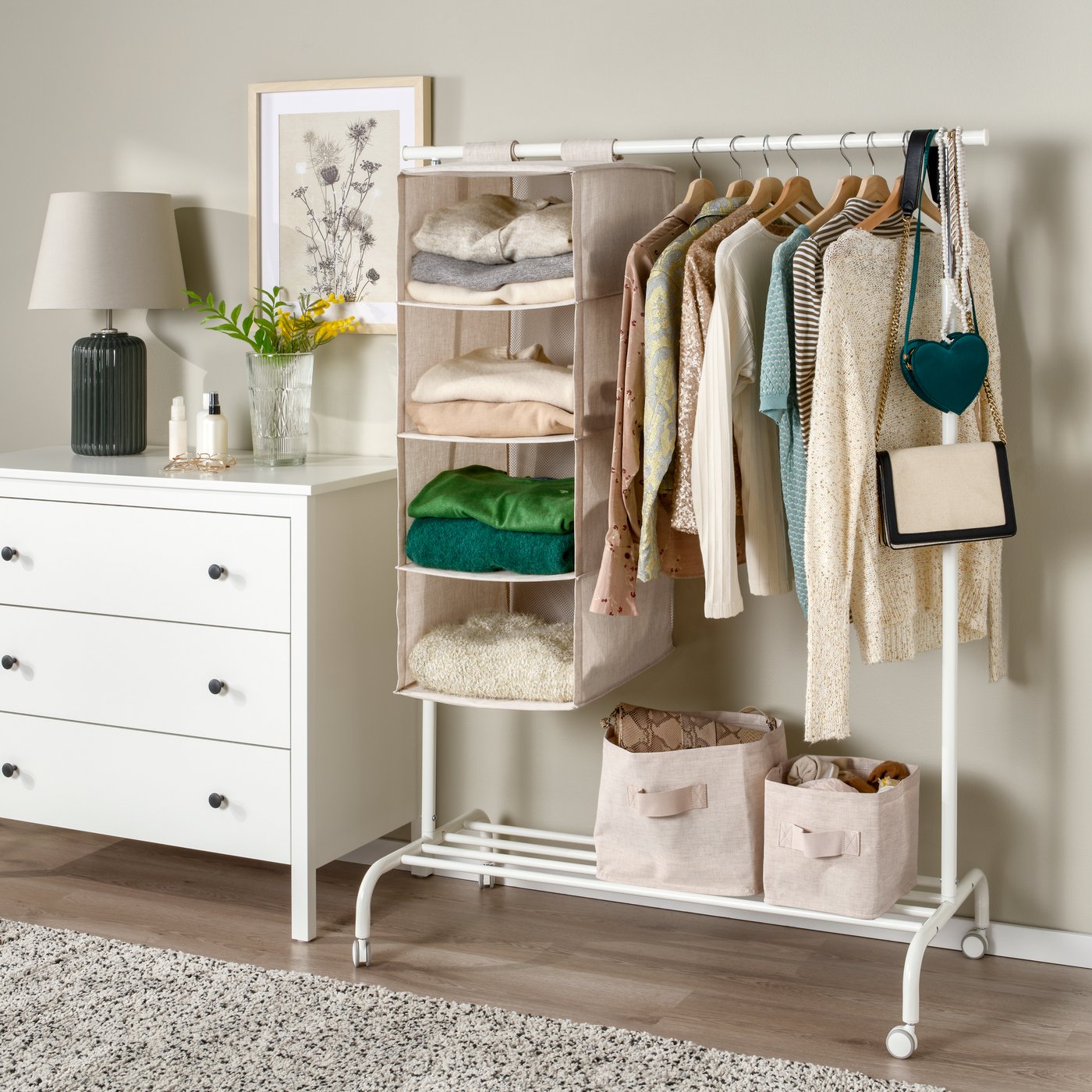 A textile/beige PURRPINGLA hanging storage w 4 compartments