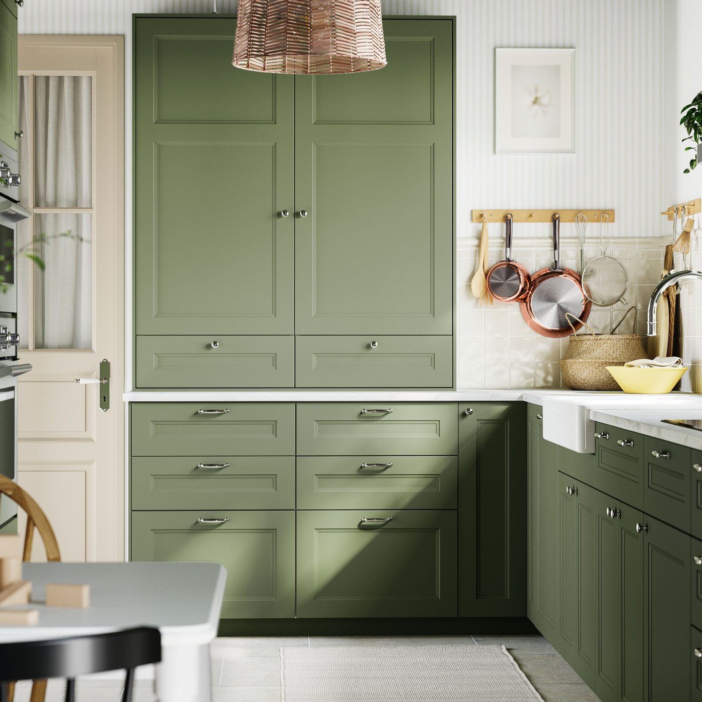 A grey-green AXSTAD door in the kitchen