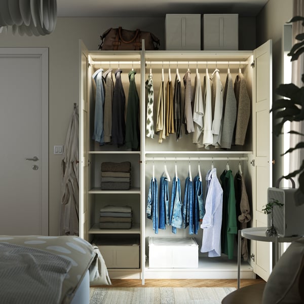 A white/white PAX wardrobe combination in the bedroom