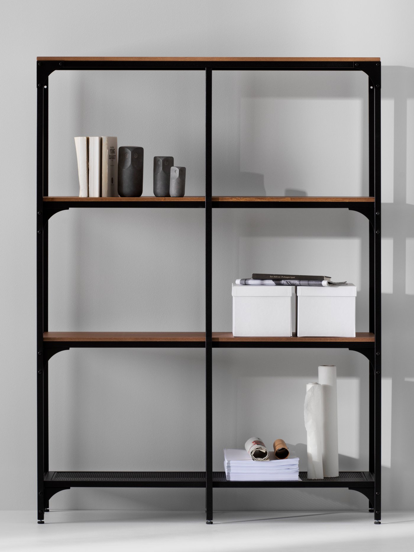A black FJÄLLBO shelving unit in the NA