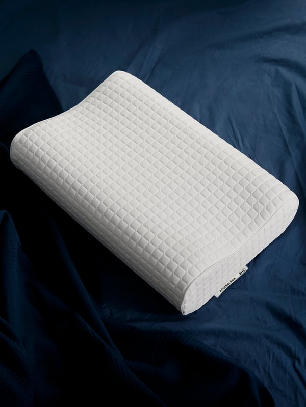 A ROSENSKÄRM ergonomic pillow, side/back sleeper in the bedroom