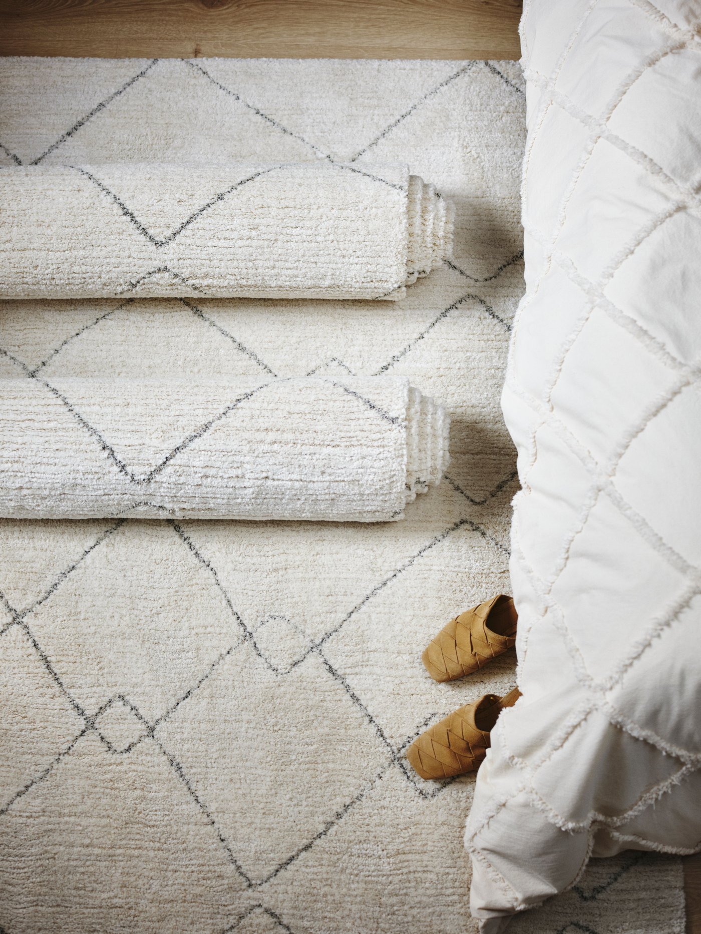 A beige TVERSTED rug, low pile in the NA