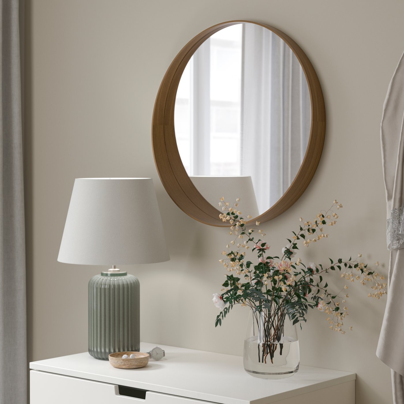 A walnut veneer STOCKHOLM mirror