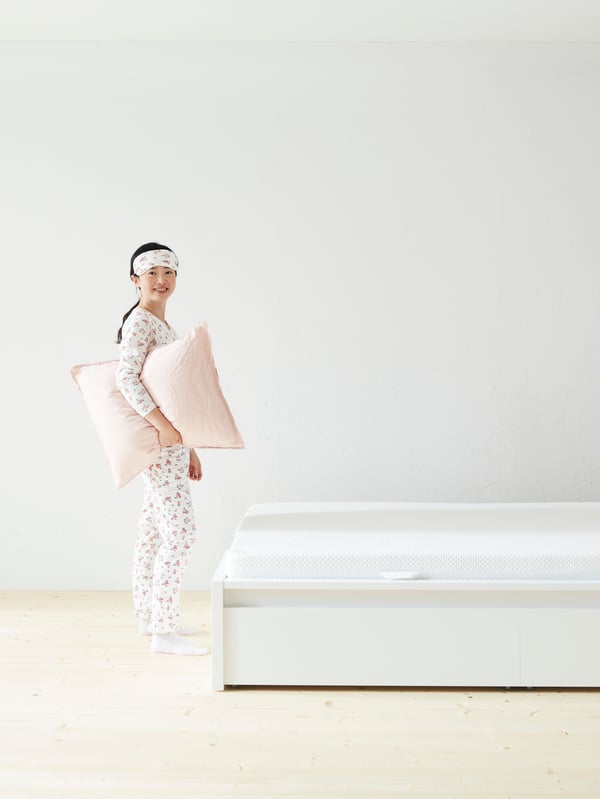 A white/Lönset MALM bed frame, high, w 2 storage boxes in the bedroom