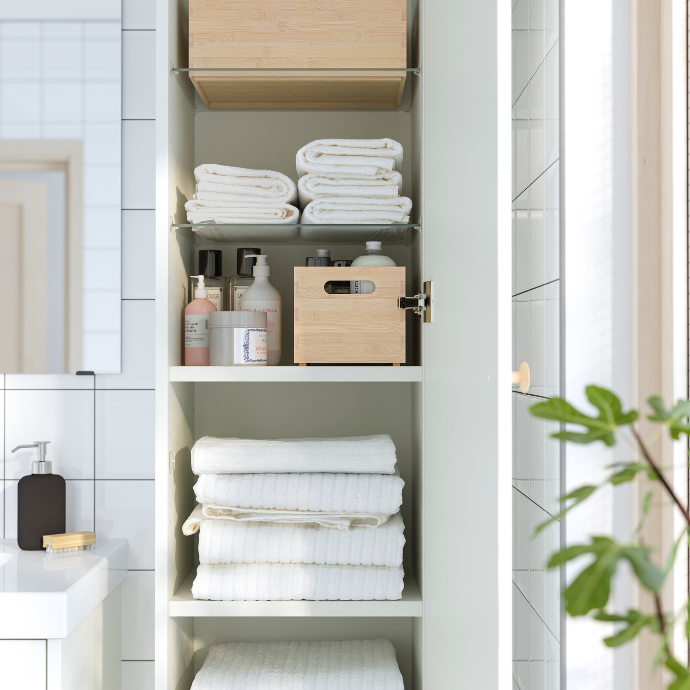 A white HAVBÄCK high cabinet with door