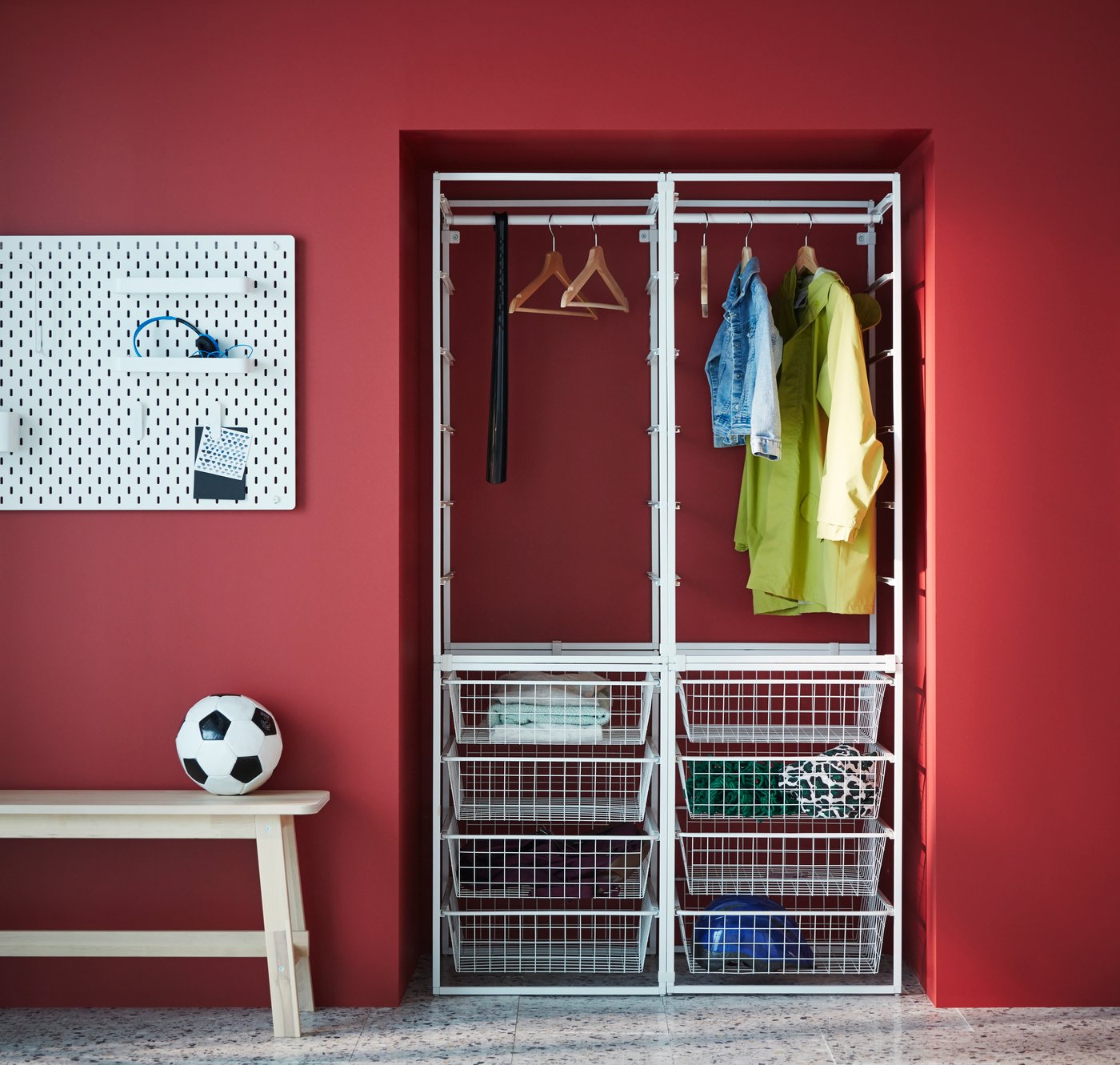 A white JONAXEL wardrobe combination in the hallway