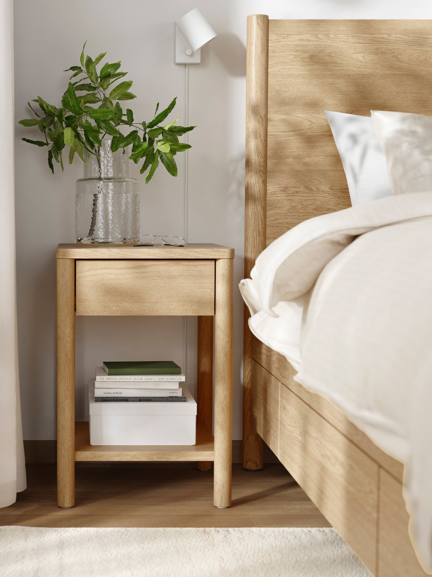 A TONSTAD bedside table with some green