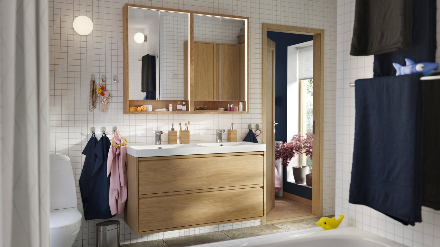 An oak effect ÄNGSJÖN wash-stand with drawers.