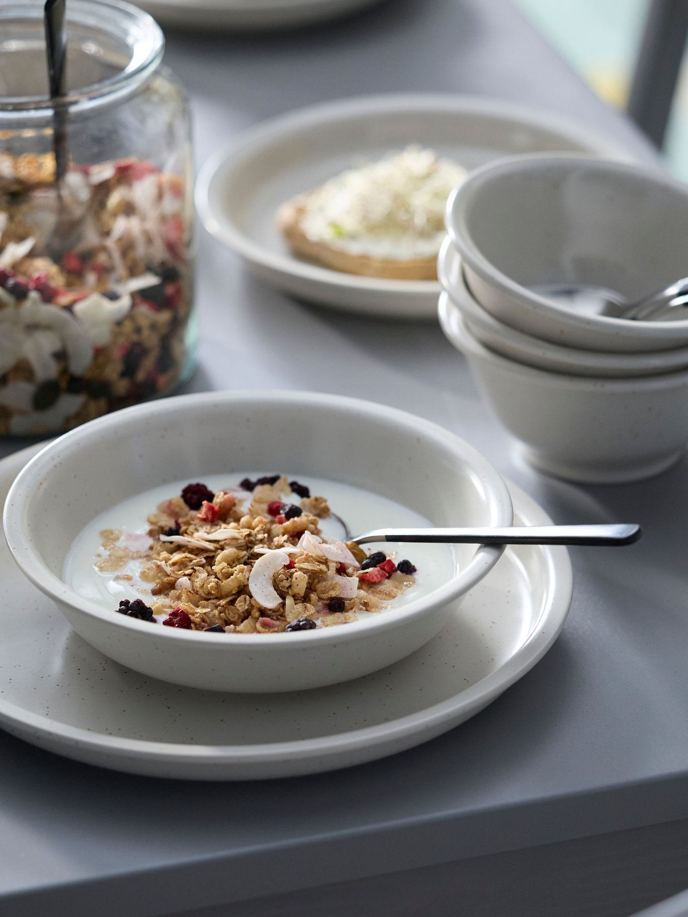A with nuts and dried berries HJÄLTEROLL granola in the NA