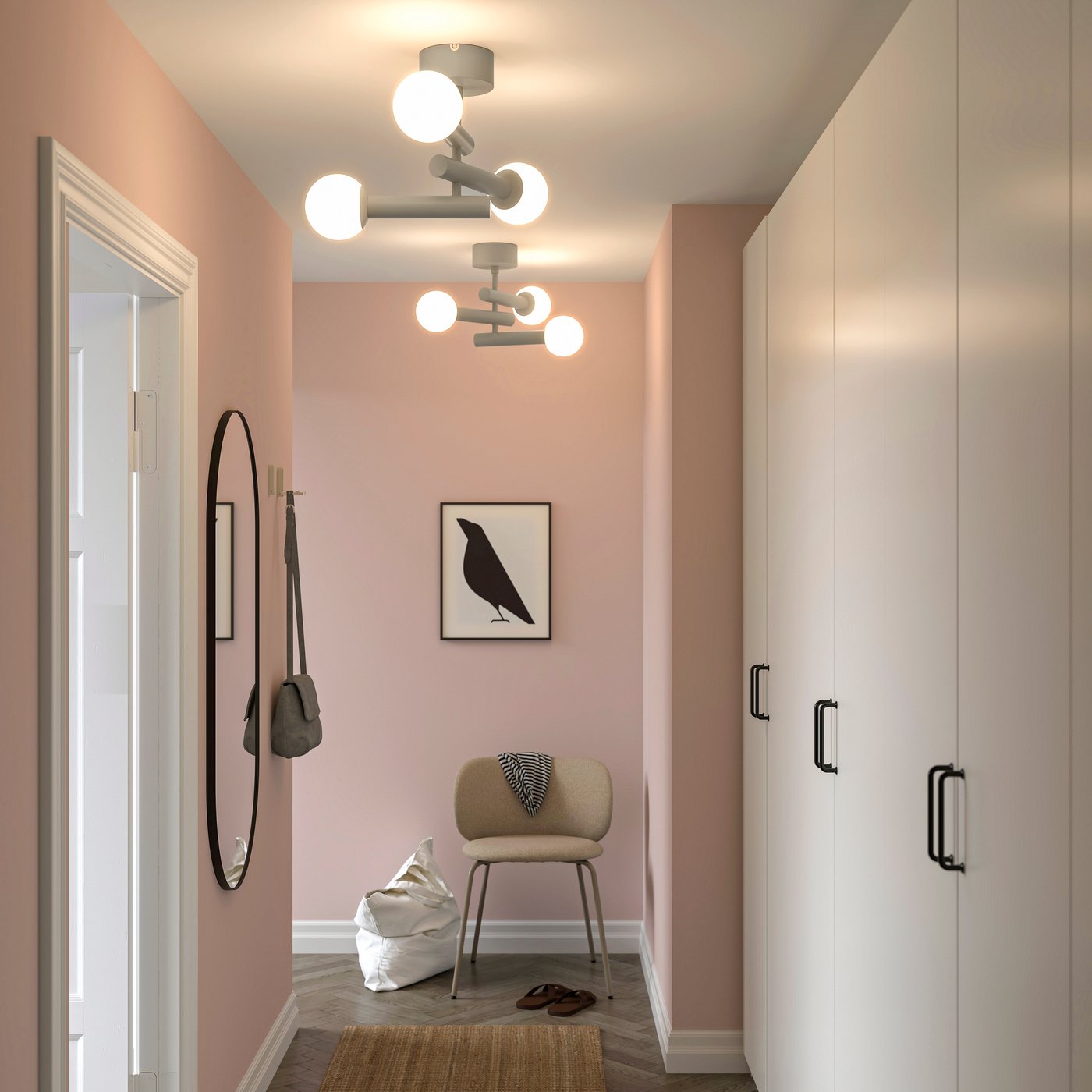 Ljus hall med rosa väggar, vita garderober och modern KRANBALK takbelysning med runda lampor. Spegel, stol och tavla med fågelmotiv kompletterar inredningen.

