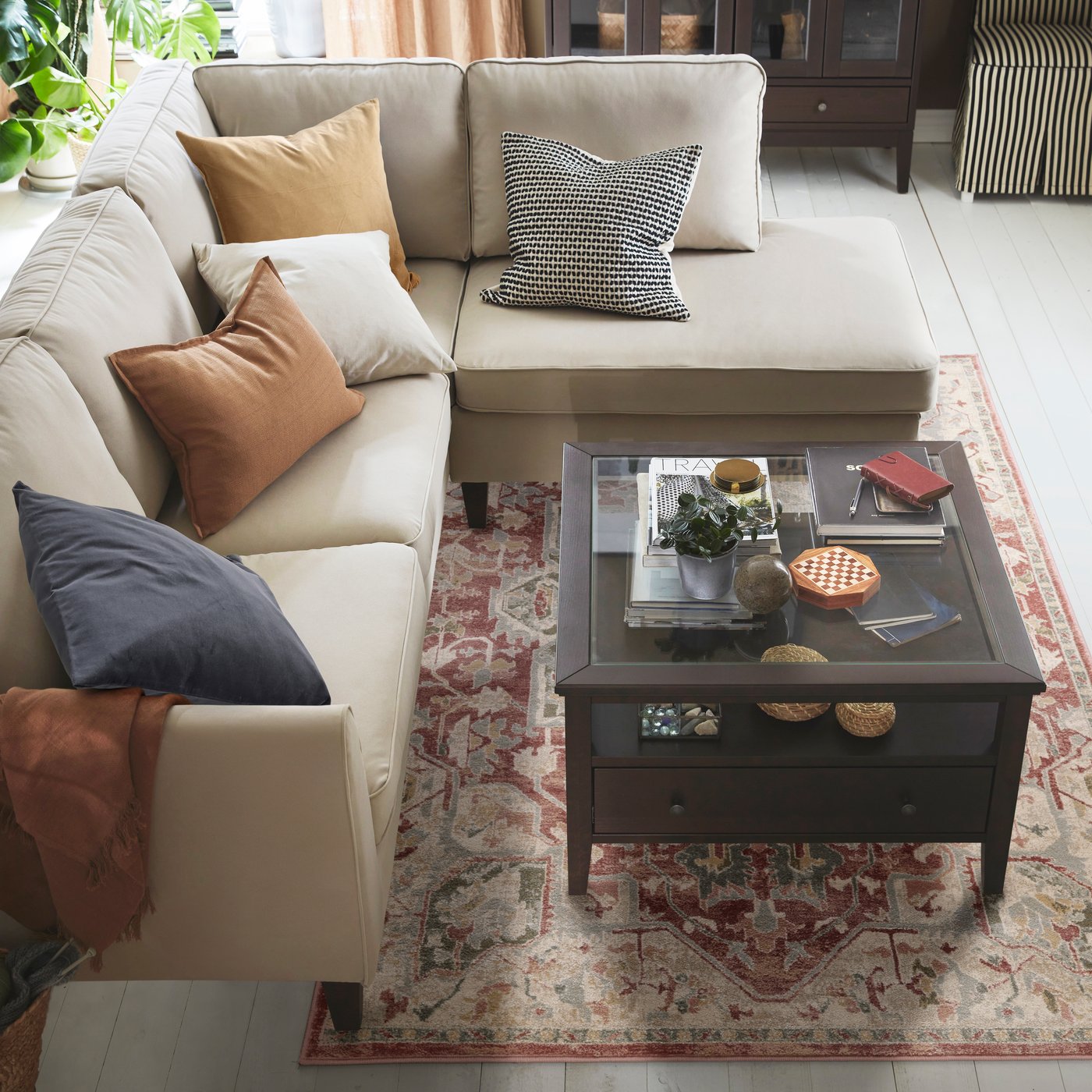 A dark grey SANELA cushion cover in the living room