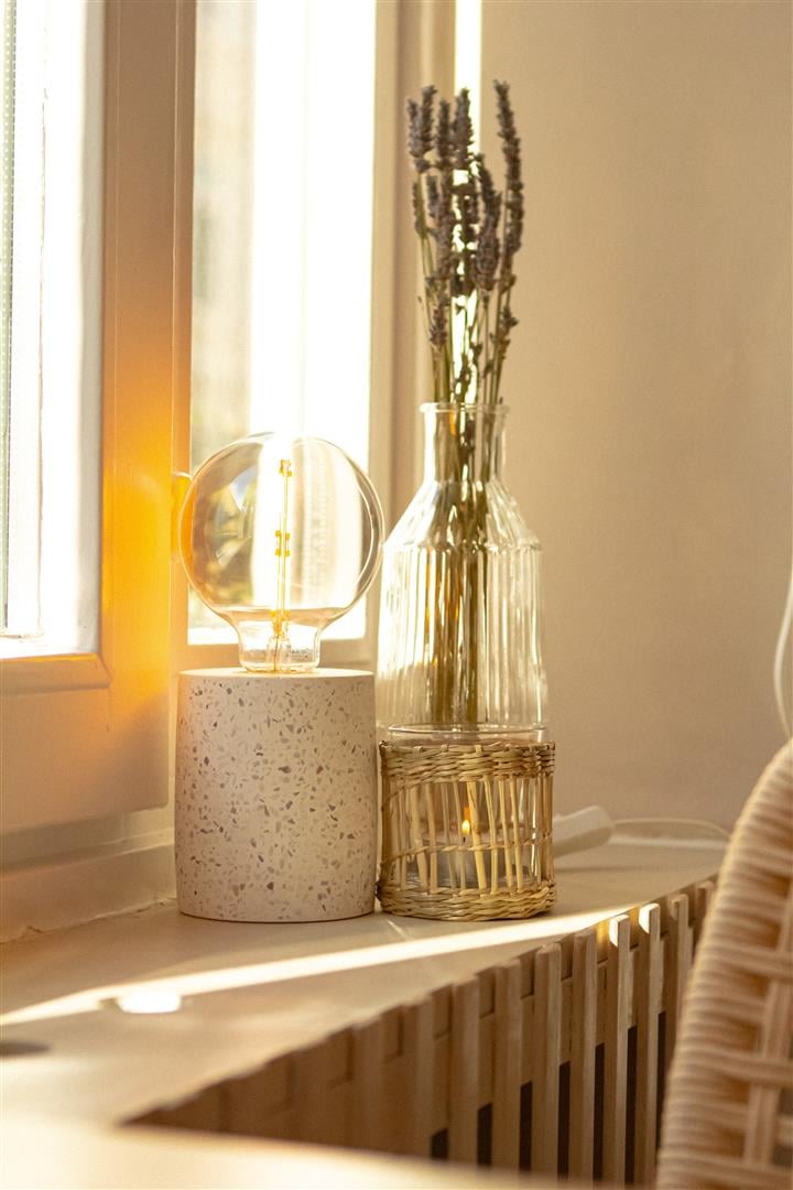 A TERTIAL work lamp and SOLHETTA bulb light being remotel contrlled by a smartphone.