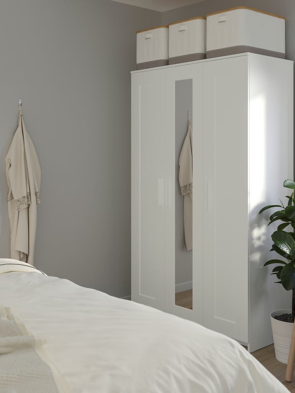 A white BRIMNES wardrobe with 3 doors