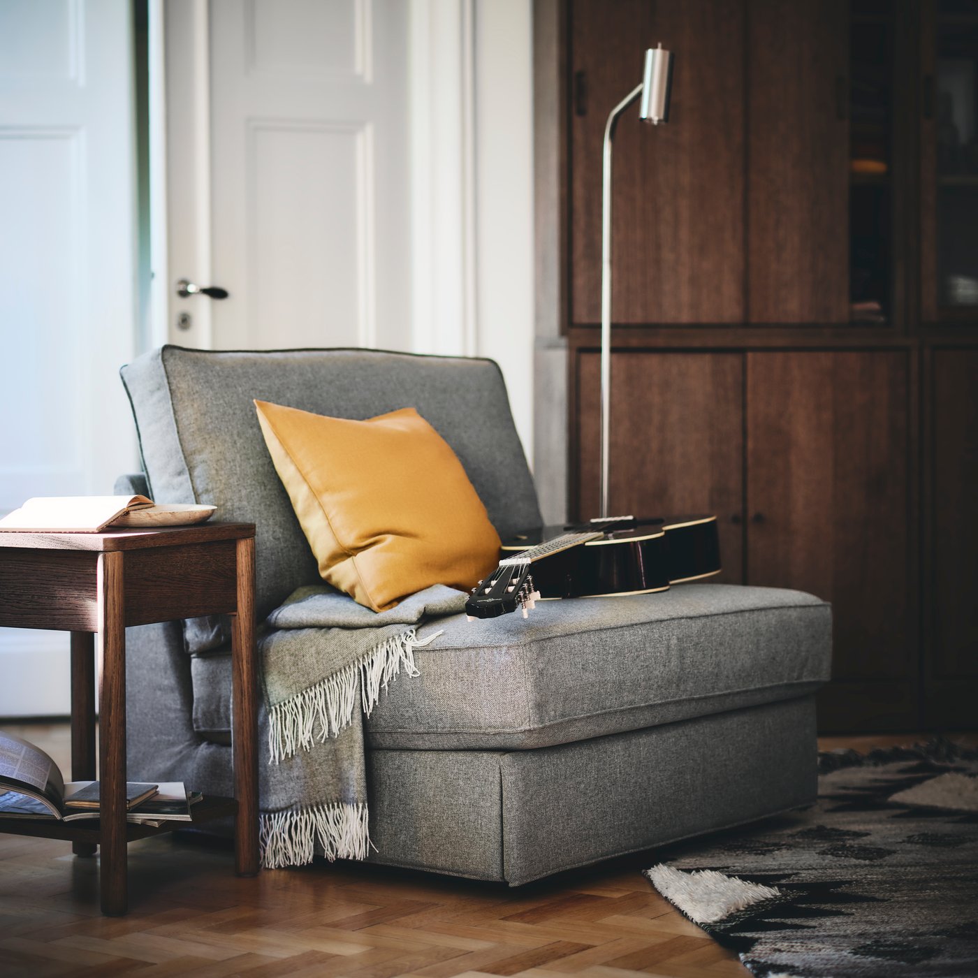 A golden-yellow GURLI cushion cover