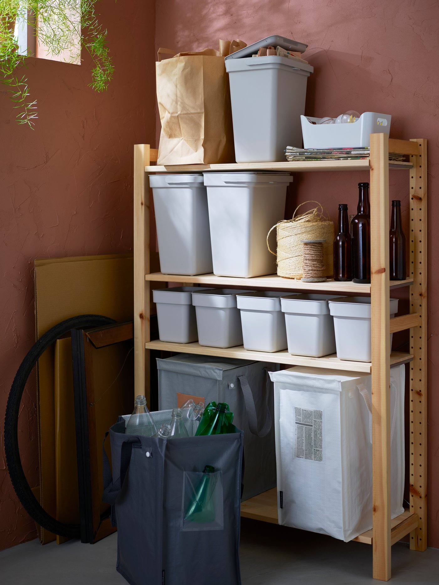 A white/dark grey/light grey DIMPA waste sorting bag
