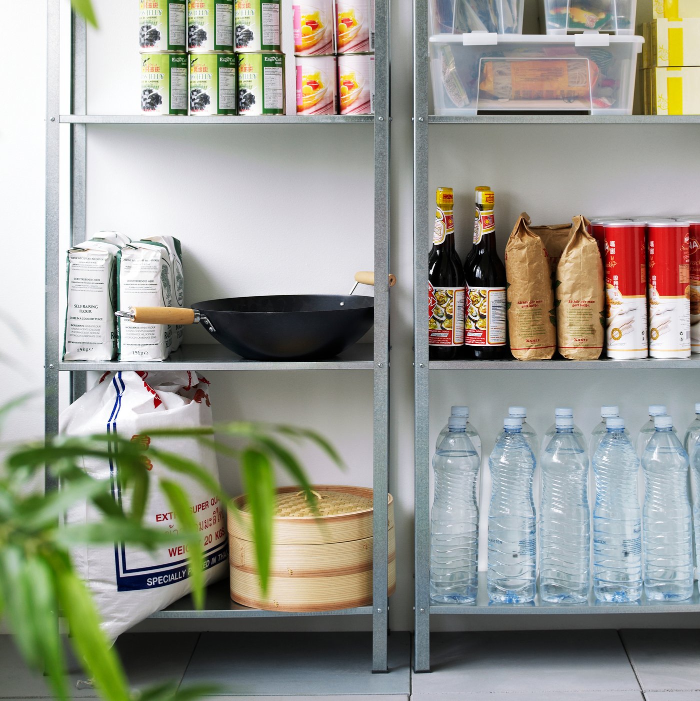 An in/outdoor HYLLIS shelving unit in the kitchen