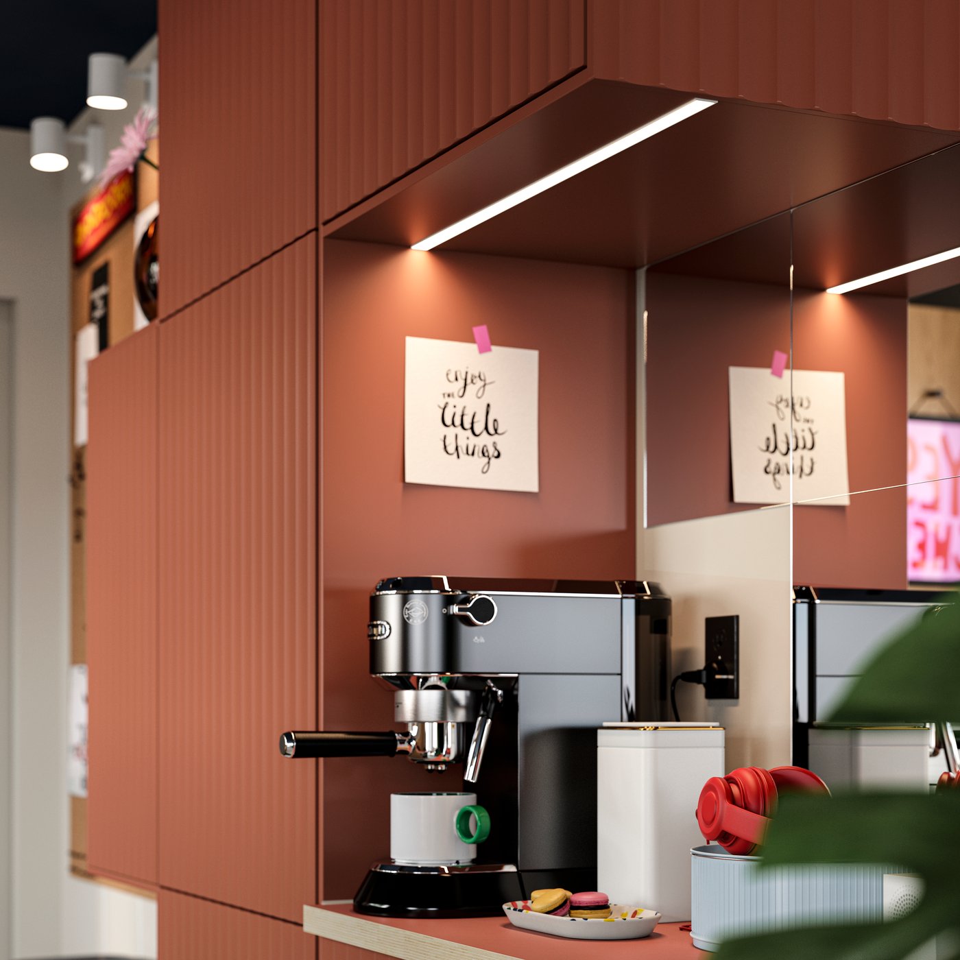A coffee maker is placed on top of a SEKTION cabinet and other kitchen cabinets are mounted on the wall above and beside it.