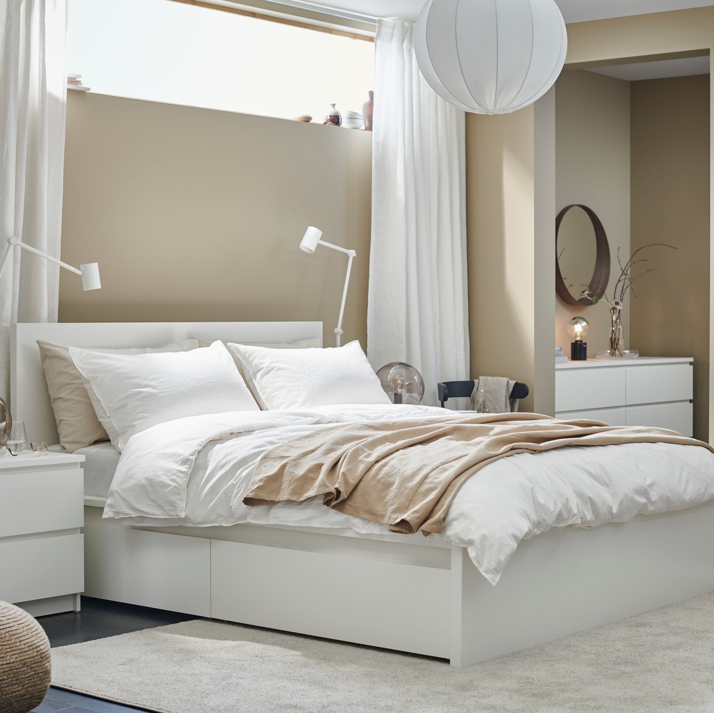 A white MALM chest of 2 drawers in the bedroom