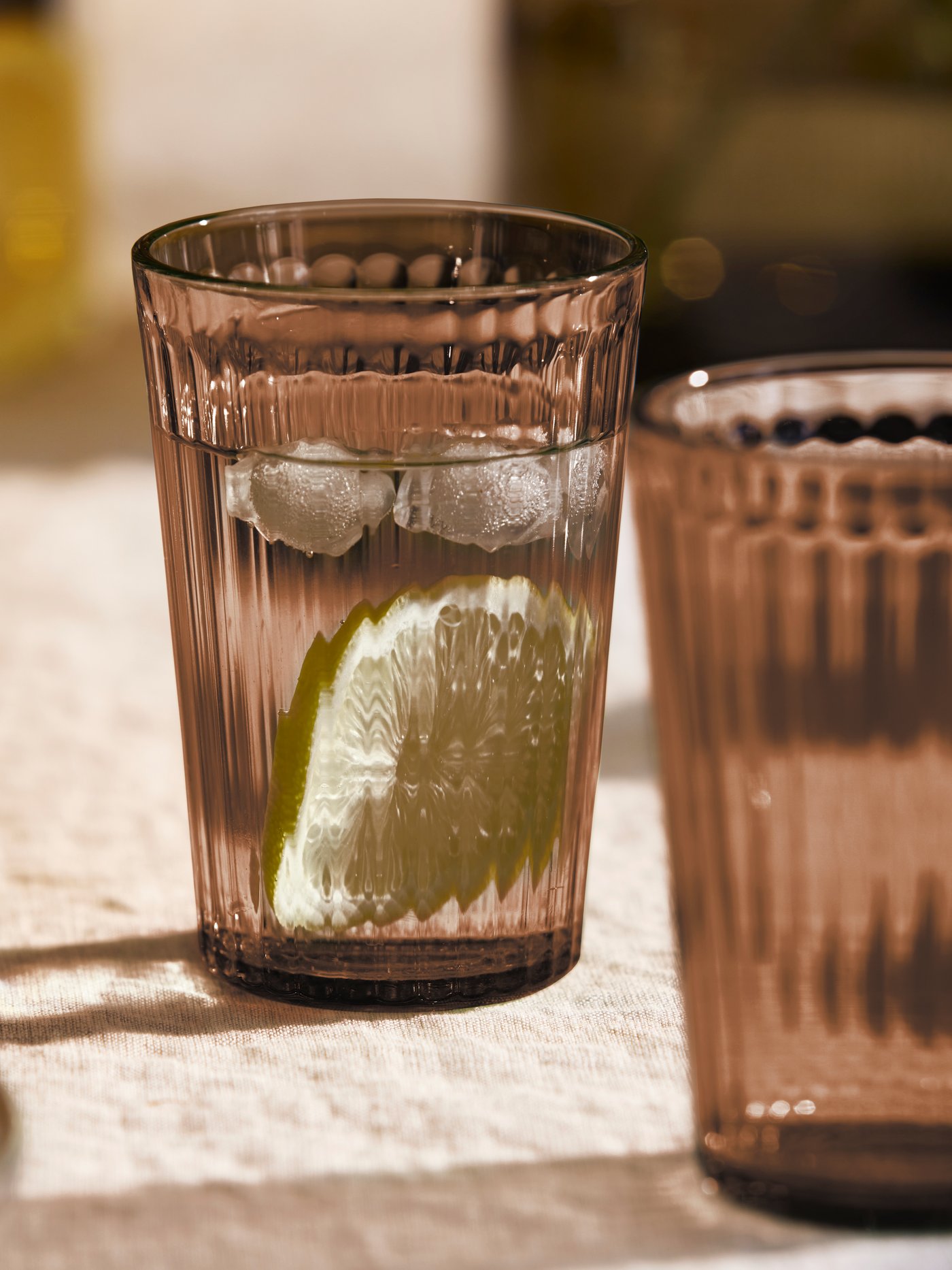 A brown VARDAGEN glass