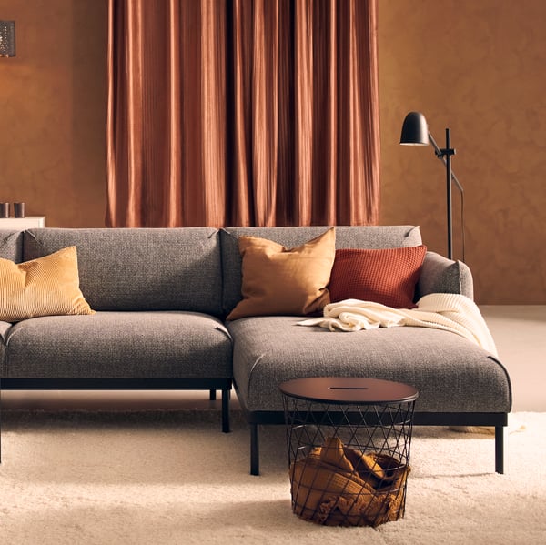 A black SKURUP floor/reading lamp in the living room