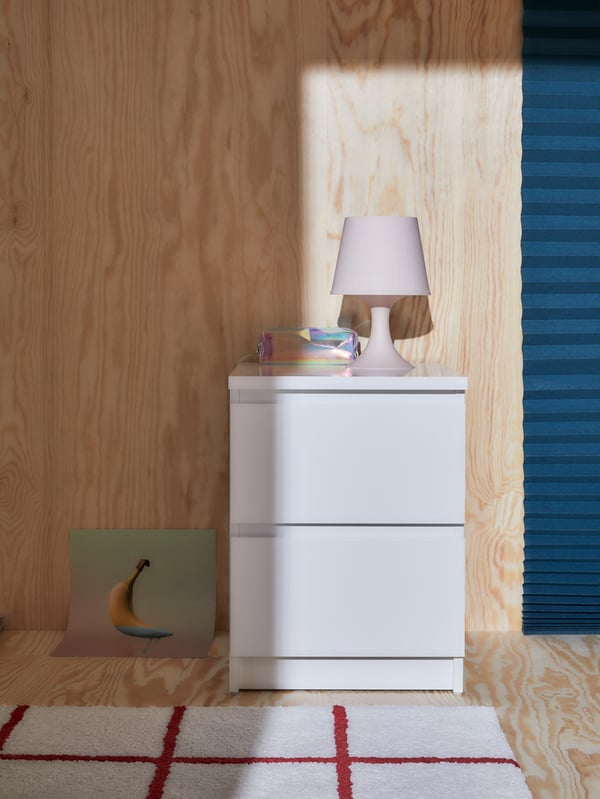 A white LAMPAN table lamp