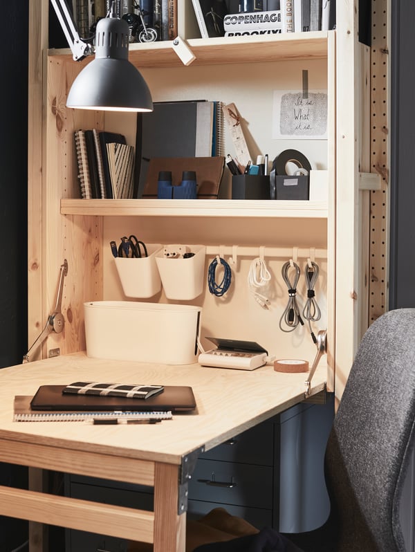ROMMA cable organizer with lid on an IVAR shelf with a SUNNERSTA hook.
