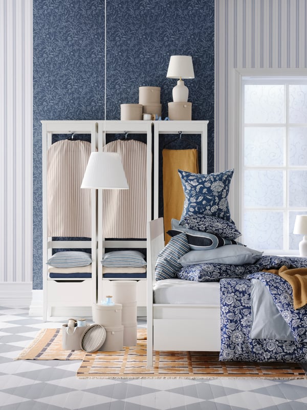 A dark grey-blue IDALINNEA cushion cover
