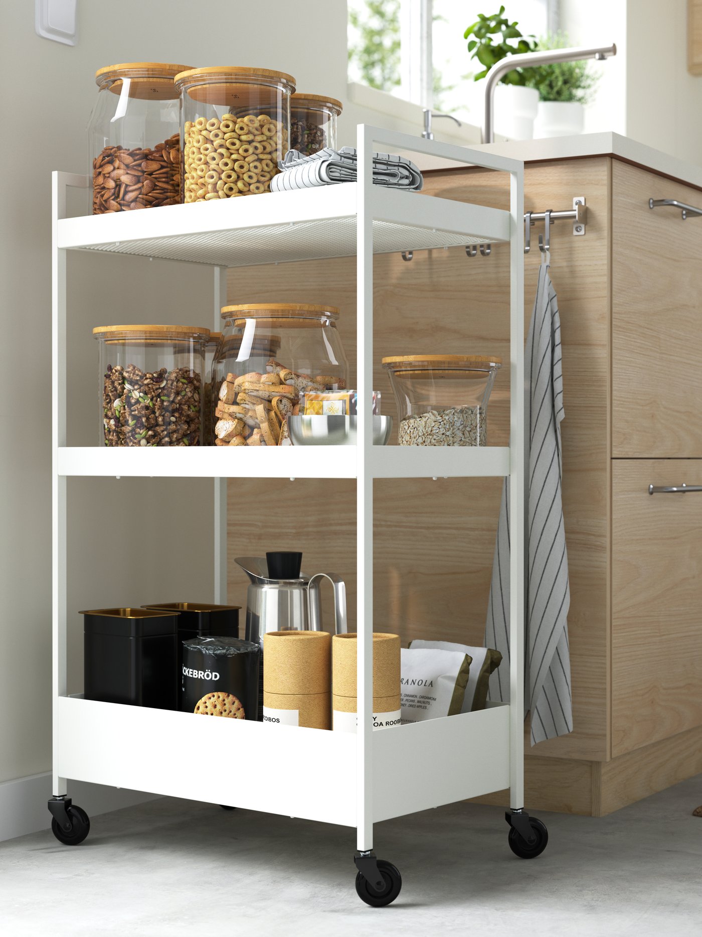 A white NISSAFORS trolley in a kitchen.