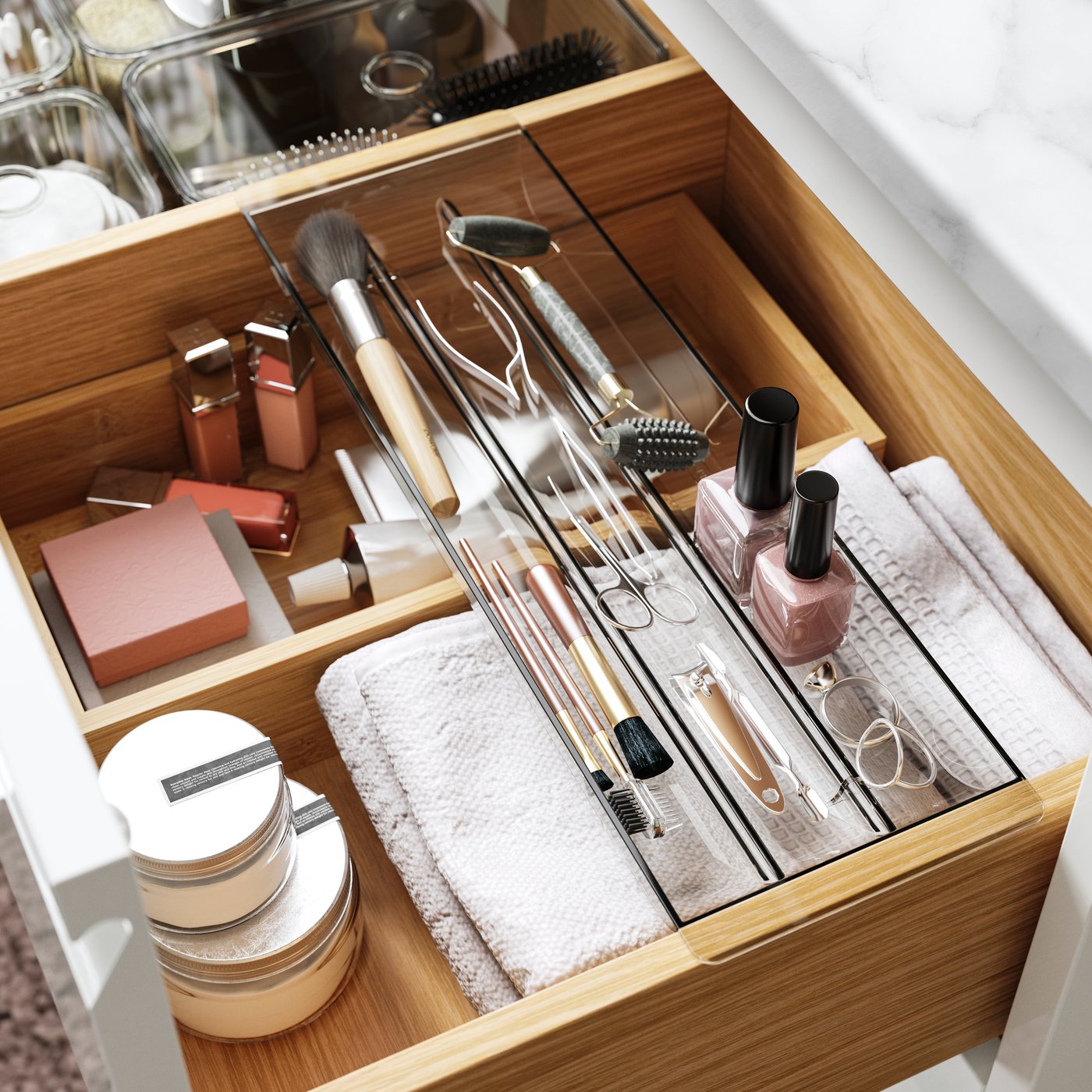 A grey VISSLAÅN drawer organiser in the bathroom